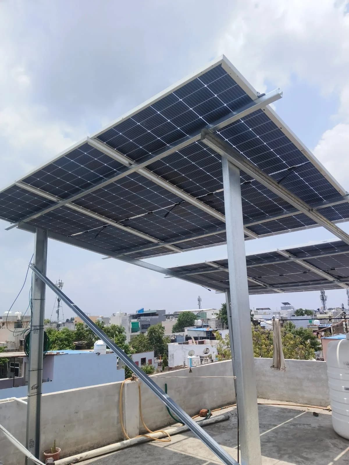 Rooftop solar array on a commercial building at sunrise